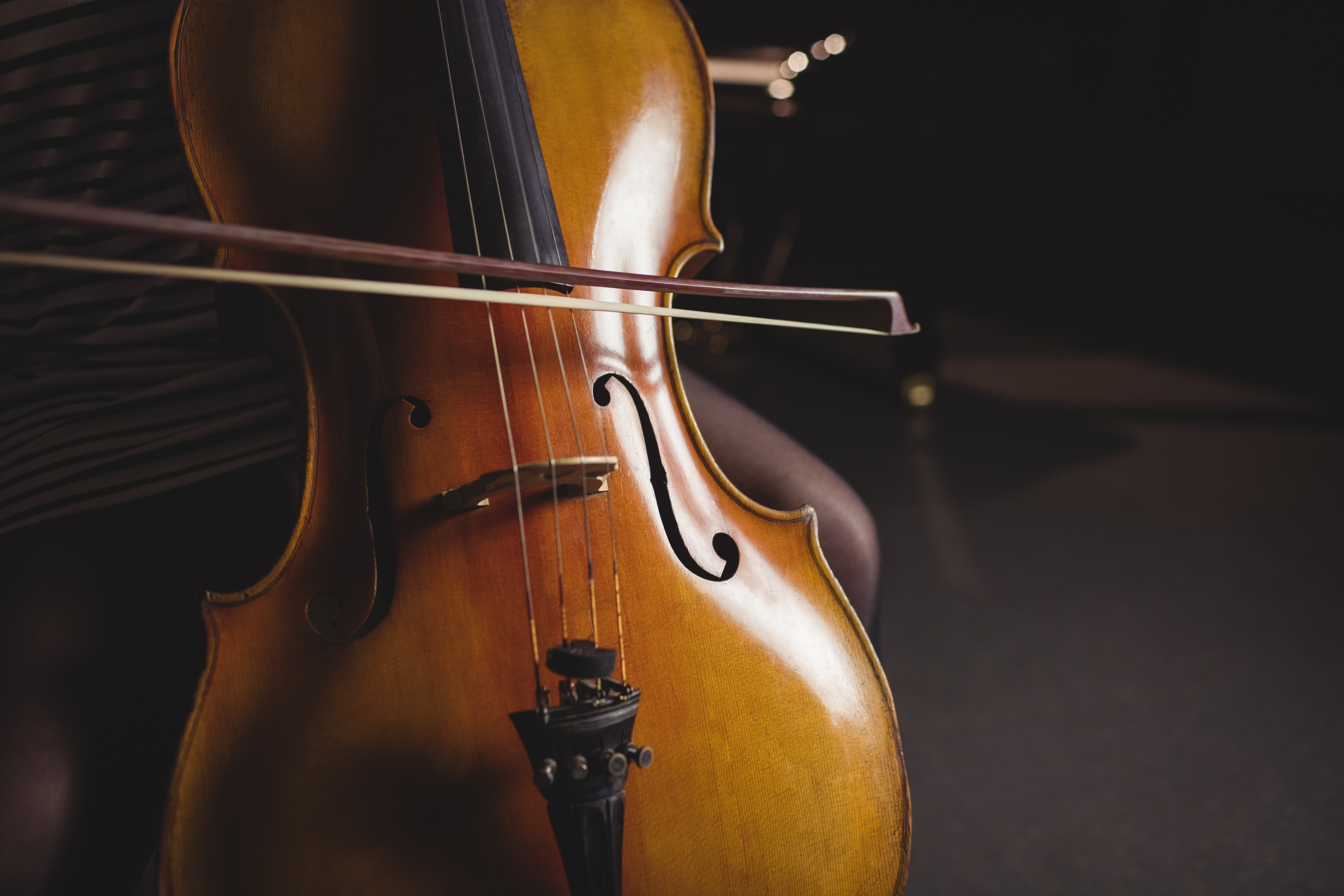 A student playing the double bass during a classical performance